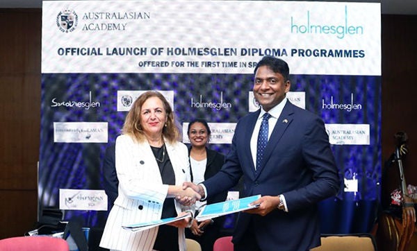 Mary Faraone and Associate Director Global Relations and Partnerships Des Perkins