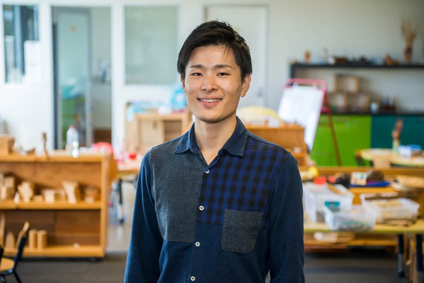 Image of an early childhood student standing in the Holmesglen childcare facility