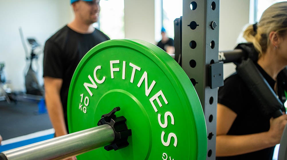 Teacher showing students how to work out in Holmesglen's finest facility