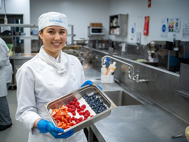 Teenage girl doing homework.