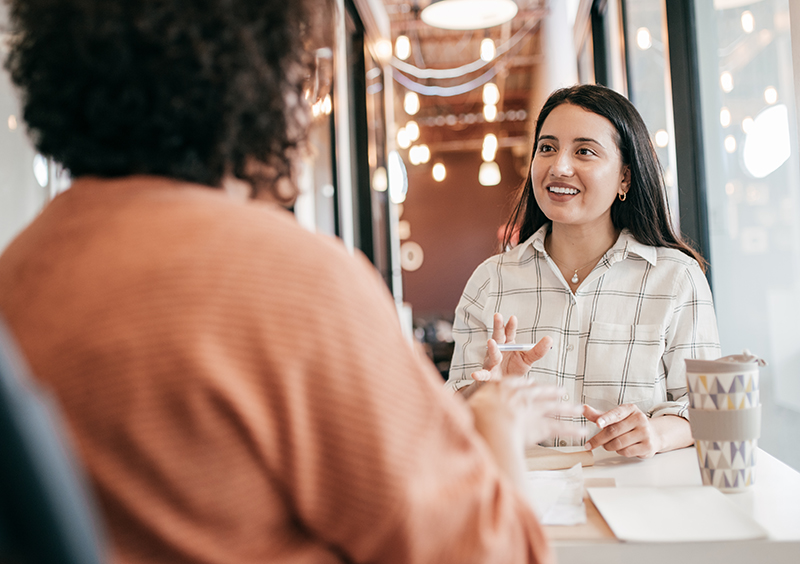 Women offering new mortgage rates to the client